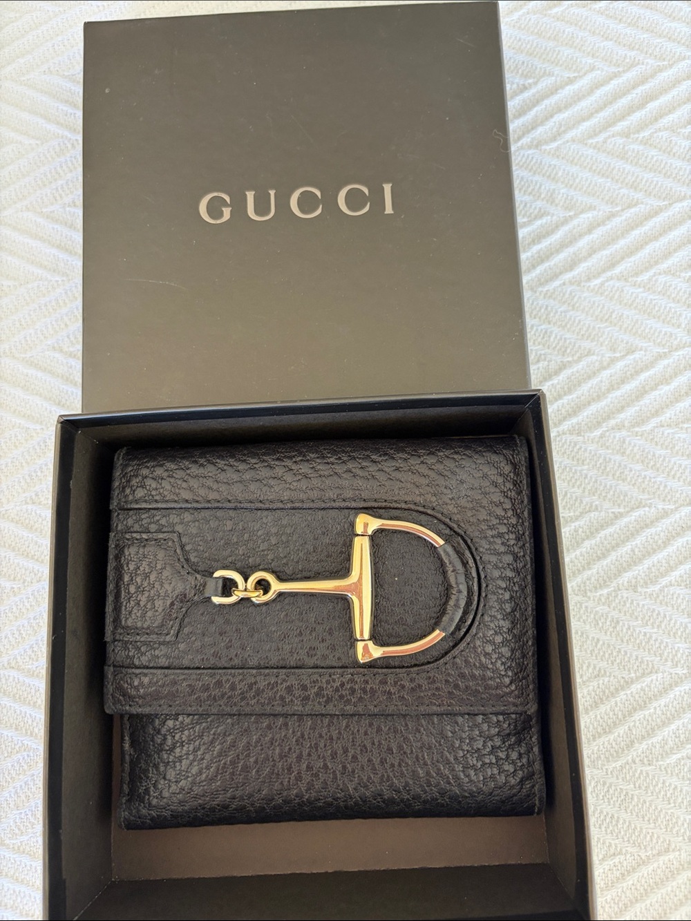 Gucci Black Pebbled Leather Men's Bifold Wallet with Gold Horsebit Accent